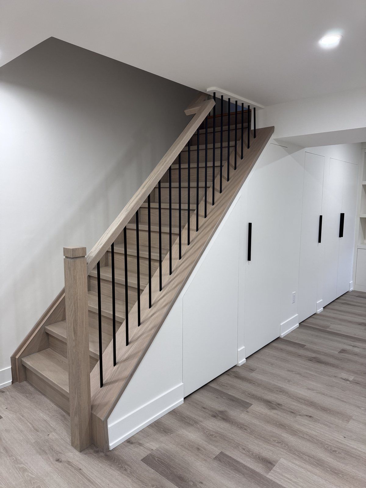A rebuilt staircase and hall with new railings